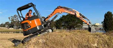 how hard is it to operate a mini excavator|installing fan on mini excavator.